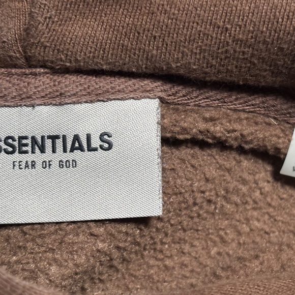 Essentials hoodie in dark brown Features front pocket and hood - Picture 5 of 11
